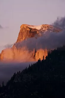 Last light falls on Half Dome as the sunsets - Yosemite National Park, California