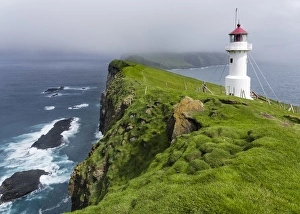 Images Dated 28th June 2016: The lighthouse on Mykinesholmur. The island Mykines, part of the Faroe Islands in