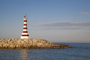 Michele Niles Prints: Lighthouse at sunset in La Romana Casa De Campo Marina at Punta Cana, Dominican Republic
