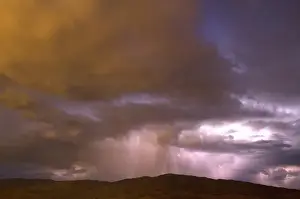 Lightning strikes during a thunderstorm on the first day of summer in Boise, Idaho, USA