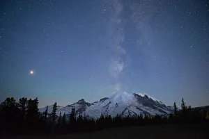 Greg Probst Prints: The lights of climbers can be seen on the mountain as the Milky Way rises behind Mt