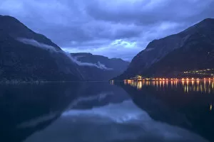 Images Dated 8th June 2004: The lights of Eidfjord glisten beneath the damatic indego skies of a Nordic night