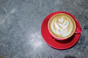 Coffee Prints: Lisbon, Portugal. Cappuccino in red cup