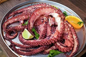 Seafood Prints: Lisbon, Portugal. Traditional grilled octopus