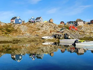 Icefjord Prints: Little Inuit village Tinit (Tiilerilaaq) at the shore of the Sermilik (Sermiligaaq) Icefjord in East Greenland
