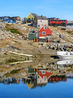 Icefjord Prints: Little Inuit village Tinit (Tiilerilaaq) at the shore of the Sermilik (Sermiligaaq) Icefjord in East Greenland
