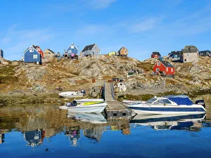 Icefjord Prints: Little Inuit village Tinit (Tiilerilaaq) at the shore of the Sermilik (Sermiligaaq) Icefjord in East Greenland