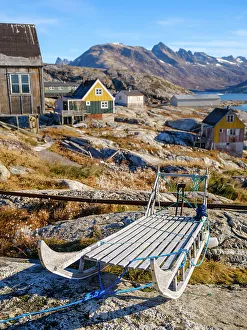 Icefjord Prints: Little Inuit village Tinit (Tiilerilaaq) at the shore of the Sermilik (Sermiligaaq) Icefjord in East Greenland