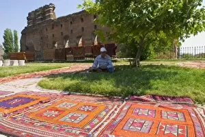 Images Dated 23rd May 2004: Local kilims sold in front of the Temple of Serapis (Red Hall / Basilica) Pergamon
