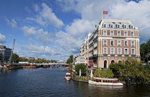 Images Dated 2027 September: Local working boats on the canals in Amsterdam, the Netherlands