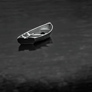 Bernard Prints: Lone boat in water