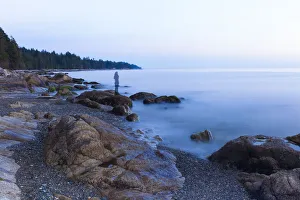 Long exposure of a transparent image of woman on the beach in Sechelt, British Columbia