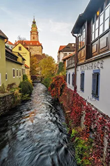 Images Dated 10th January 2023: Looking down canal to Castle Tower in Cesky Krumlov, Czech Republic