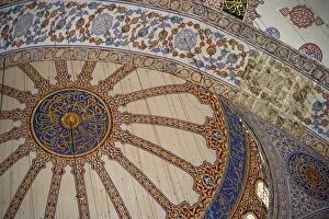 Looking up into the dome of the Blue Mosque with all of its blue tile work, Istanbul
