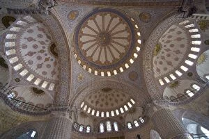 Images Dated 30th September 2005: Looking up into the dome of the Blue Mosque with all of its blue tile work, Istanbul