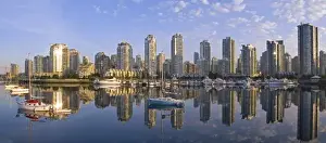 Water Craft Prints: Looking across False Creek at the skyline of Vancouver British Columbia at sunrise
