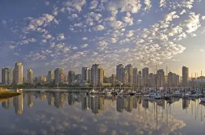 Images Dated 25th July 2008: Looking across False Creek at the skyline of Vancouver British Columbia at sunrise