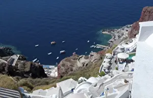 Images Dated 2028: Looking down at fishing village in Oia in Santorini Greece in the Greek Islands