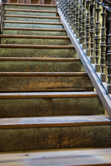 Looking up an old wooden staircase, New York City, New York, USA Looking up an old wooden staircase, New York City, New York, USA