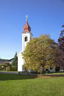 Inti St Clair Prints: Lower Austria, Austria - Low angle view of a church in a rural area
