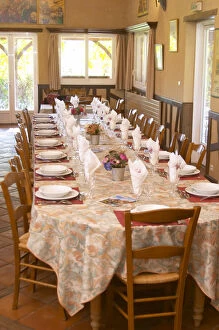 Lunch table set for many guests ready to be served duck specialities. Ferme de Biorne duck