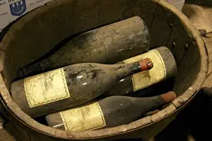 Mature Prints: Magnum bottles in a small wooden vat at Chateau Saint Cosme, Gigondas, Vaucluse