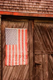 Images Dated 15th October 2005: Maine, Faded American flag on door of old barn