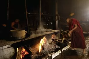 Making yak butter tea in the kitchen of Songzhanling Monastery. Zhongdian. Deqin