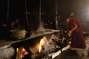 Images Dated 31st May 2006: Making yak butter tea in the kitchen of Songzhanling Monastery. Zhongdian. Deqin