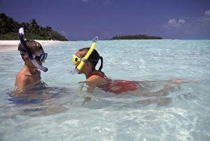 Snorkel Prints: Maldives. Kids aged 12 snorkelling (MR)