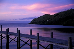 Maldives Prints: Maldives. View of dock at sunset