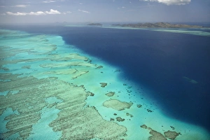Turquoise Prints: Malolo Barrier Reef and Malolo Island, Mamanuca Islands, Fiji, South Pacific - aerial