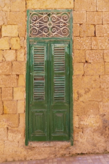 Malta Prints: Malta, Birgu. Green shuttered door on stone wall