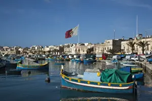 Images Dated 28th March 2010: Malta, Southeast, Marsaxlokk, harbor and traditional Luzzu fishing boats