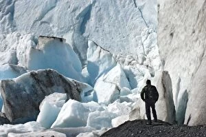 Man at base of Exit Glacier, Kenai Fjords National Park, AK (MR)