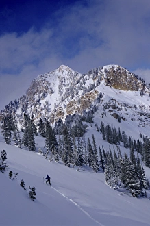 Climbing Prints: Man on a long climb to ridge, Uinta Wasatch-Cache National Forest, near Salt Lake City