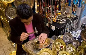 Images Dated 9th January 2021: Man pounding metal plates in streets of the Medina area of Tunis Tunisia of Northern