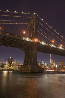 New York Prints: The Manhattan Bridge and Manhattan skyline in the evening light from Brooklyn Bridge Park