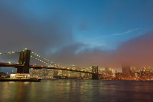 New York City Prints: Manhattan skyline and the Brooklyn bridge in the mist at dusk