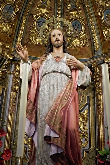 Gilded Prints: Marbella, Spain. Statue of Jesus on a gilded altar inside an ancient Spanish church
