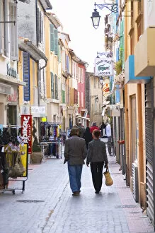 A market street in the old town, people walking on the street Sanary Var Cote daA┬ÇA┬ÖAzur