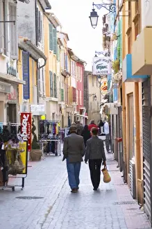 Entry Prints: A market street in the old town, people walking on the street Sanary Var Cote daaAzur