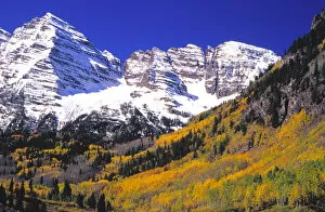Maroon Bells and aspens in Snowmass Wilderness Area in autumn