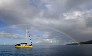 Images Dated 14th February 2007: MARTINIQUE. French Antilles. West Indies. Rainbow over sailboat anchored in harbor at St