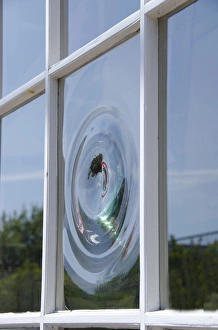 Images Dated 28th July 2011: Massachusetts, Nantucket Island. Vintage bullseye glass window