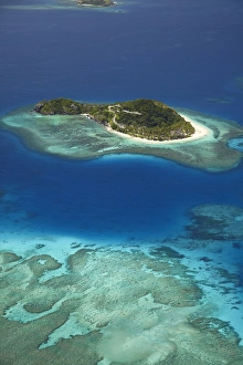 Barrier Prints: Matamanoa Island and coral reef, Mamanuca Islands, Fiji, South Pacific - aerial