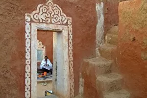 Mauritania, Eating in the house garden in Oualata