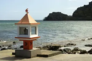 Pray Prints: Mauritius, Baie du Cap. Roadside Hindu place of worship at the oceans edge