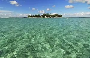 Mauritius, Blue Bay, turquoise rippled water with the view of island in distant against