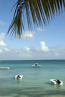 Mauritius, Grand Baie. Boats anchored in the calm tropical waters of Grand Baie